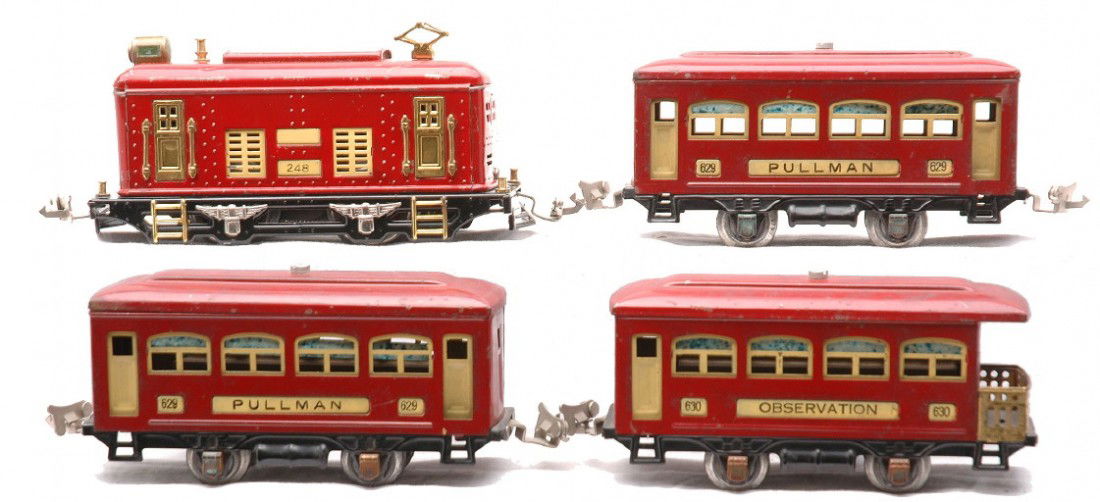 Lionel Red Passenger Set 248 629 629 630: Lionel prewar O gauge red passenger set including; 248 electric 0-4-0 loco, two 629 Pullmans and a 630 observation. The cars have cream inserts and copper journals. The set is C5-6.