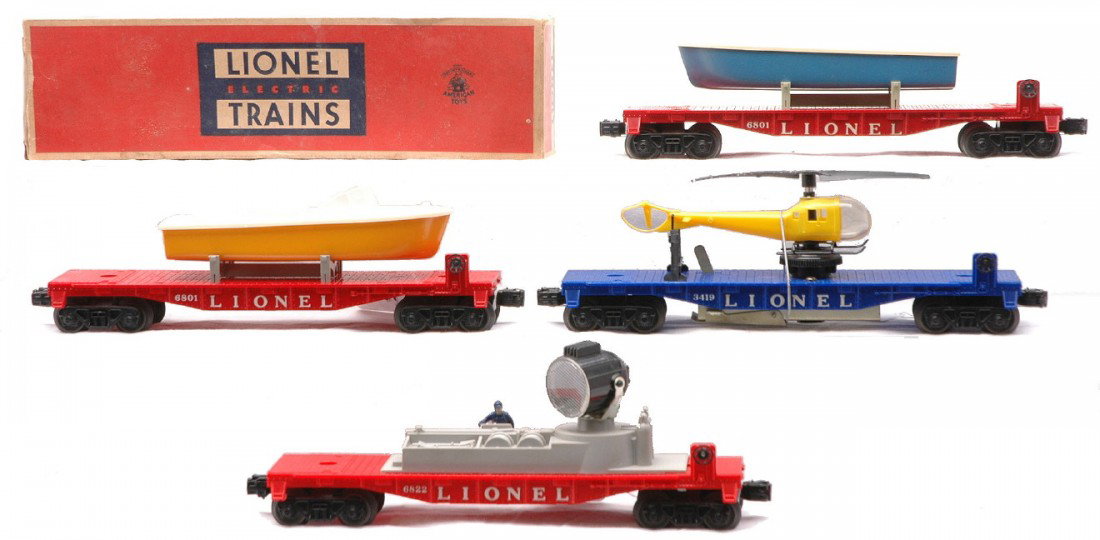 Lionel Fright Cars 3419 6801 6801-75 OB 6822: Lionel postwar freight cars including; 3419 blue flatcar with a helicopter, 6801-75 red flatcar with a boat that has a blue hull and white deck in OB, 6801 red flatcar with a boat that has a yellow hu