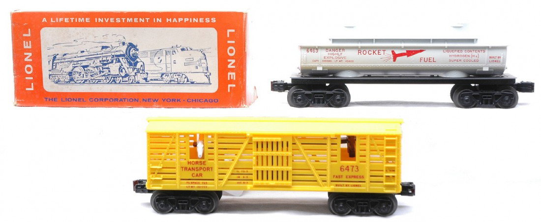 Lionel 6463 Rocket Fuel 6473 Horse Transport LN: Lionel postwar 6463 Rocket Fuel two dome tank car in OB. The car has very light run time and is C8-9. The OB has all flaps attached. Also included is a 6473 yellow horse transport car in a reproductio