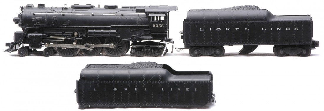 Lionel 2055 Loco 2046W Tender & Tender Shell: Lionel postwar 2055 black 4-6-4 steam loco with a 2046W tender. The loco is C6. The tender is cracked on the end and has one broken step. Also included is a tender shell only. The tender shell has a b