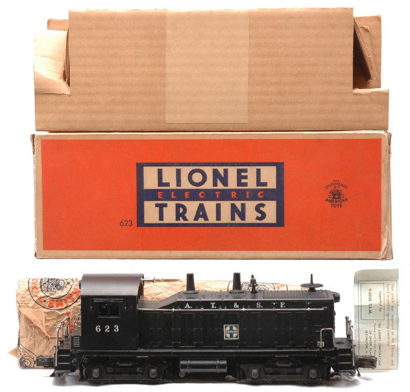 Lionel 623 Santa Fe NW2 Switcher LN Boxed: Lionel postwar 623 Santa Fe NW 2 Switcher diesel loco in OB with original cardboard insert, paper and inspection tag. The switcher is C8. One of the interior flaps on the box is detached but included