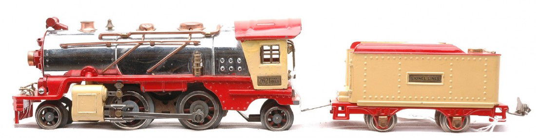 Lionel Chrome/Red/Yellow 262 Loco 262T Tender: Lionel prewar O gauge 262 steam 2-4-2 loco and a 262T tender with copper and brass trim. The loco has been restored in chrome, red and yellow and the tender has been restored in red, yellow and white.