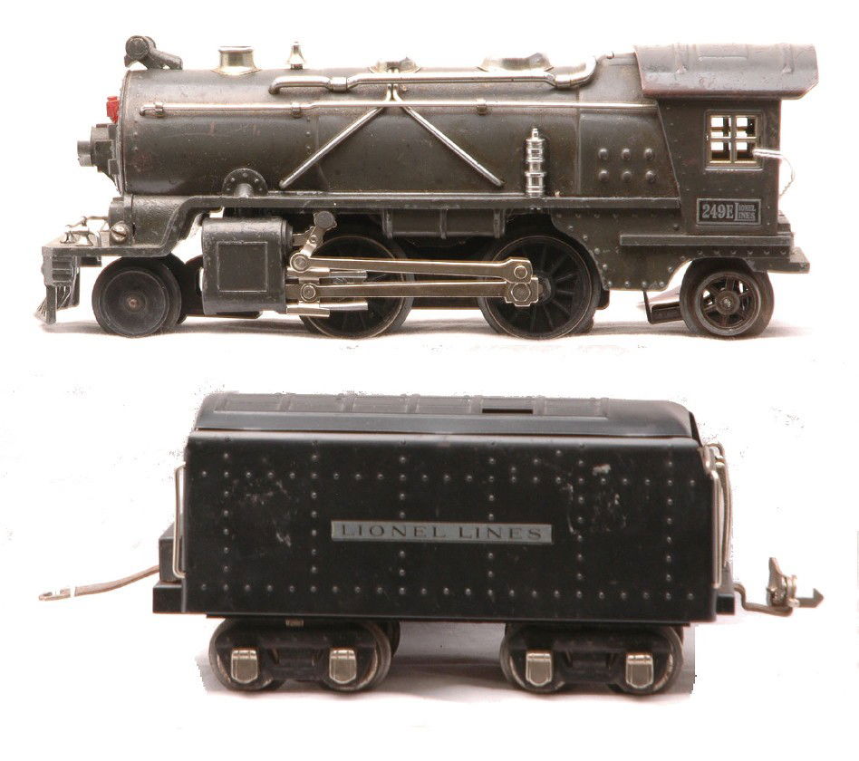 Lionel 249E Gunmetal Loco 265W Black Tender: Lionel prewar O gauge 249E gun metal 2-4-2 steam loco and also included is a black 265W tender. The drawbar and coupler on the tender have been reattached with nut and screw. Both are C5.