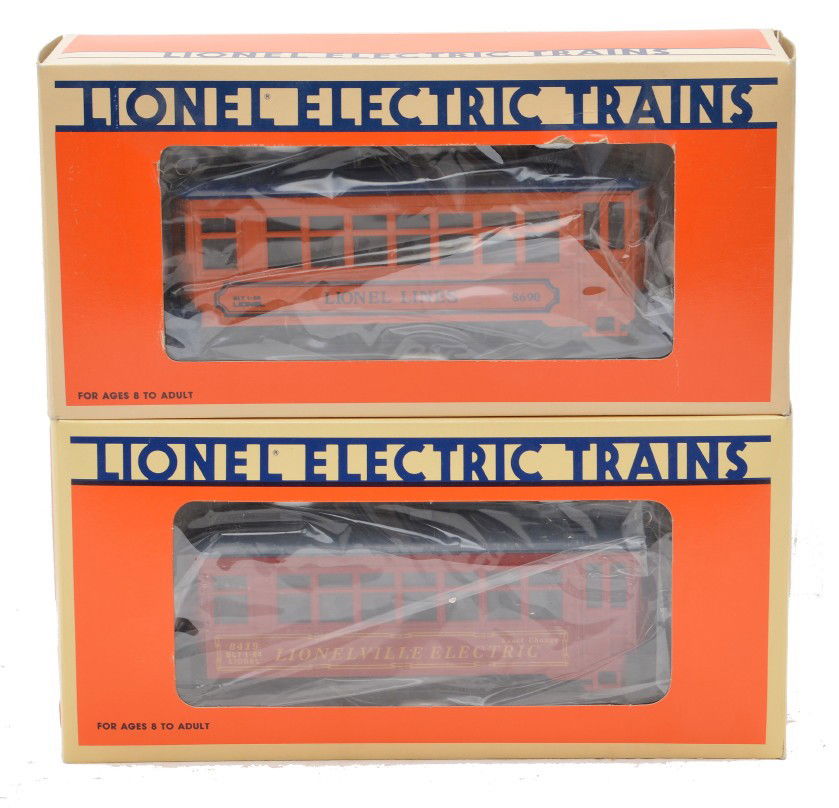 Lionel 8690 Trolley 18419 Lionelville Trolley MIB: Lionel 8690 LL trolley car and a 18419 Lionelville electric trolley both in OBs. The 8690 has been test run, C9 and the 18419 has never been run, C10.