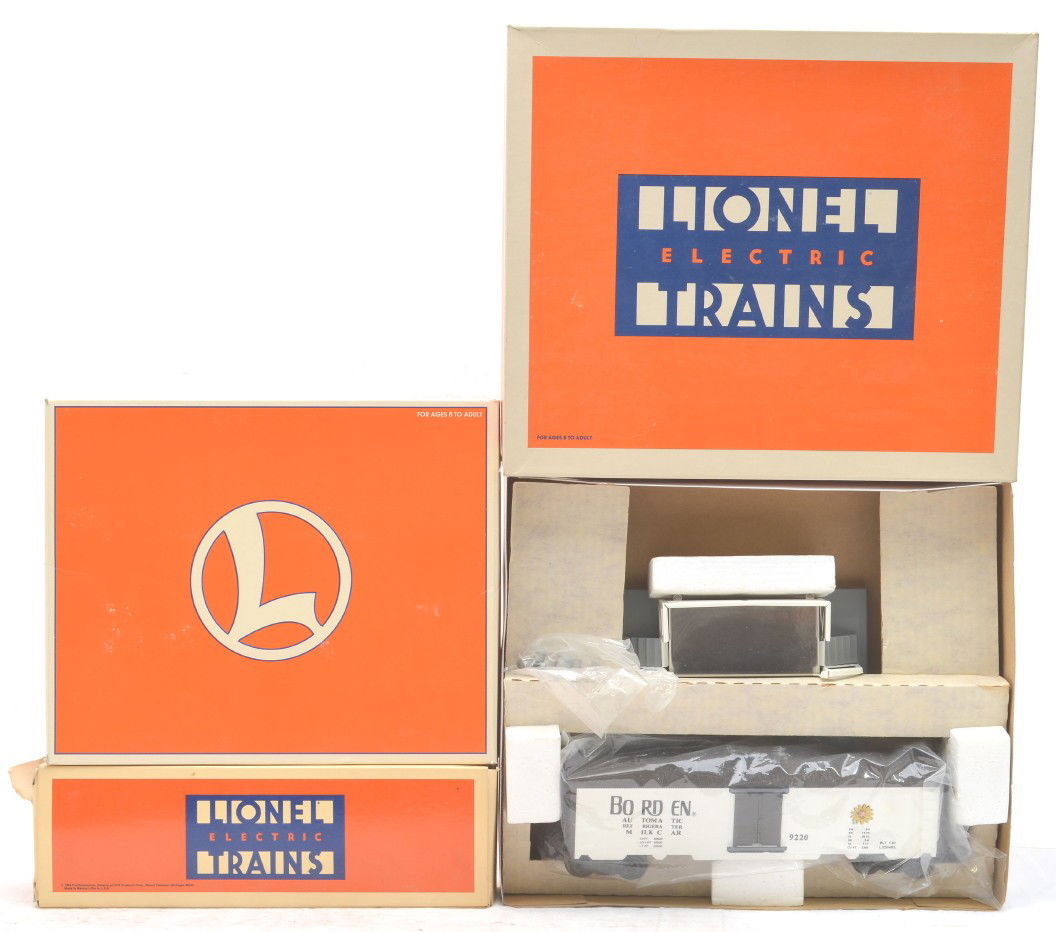 Lionel 9220 Milk Car 19828 Cattle 9225 Barrel MIB: Lionel 9220 operating milk car, 19828 C&NW operating cattle car and stockyard and a 9225 Conrail operating barrel car all in OBs, C9-10.