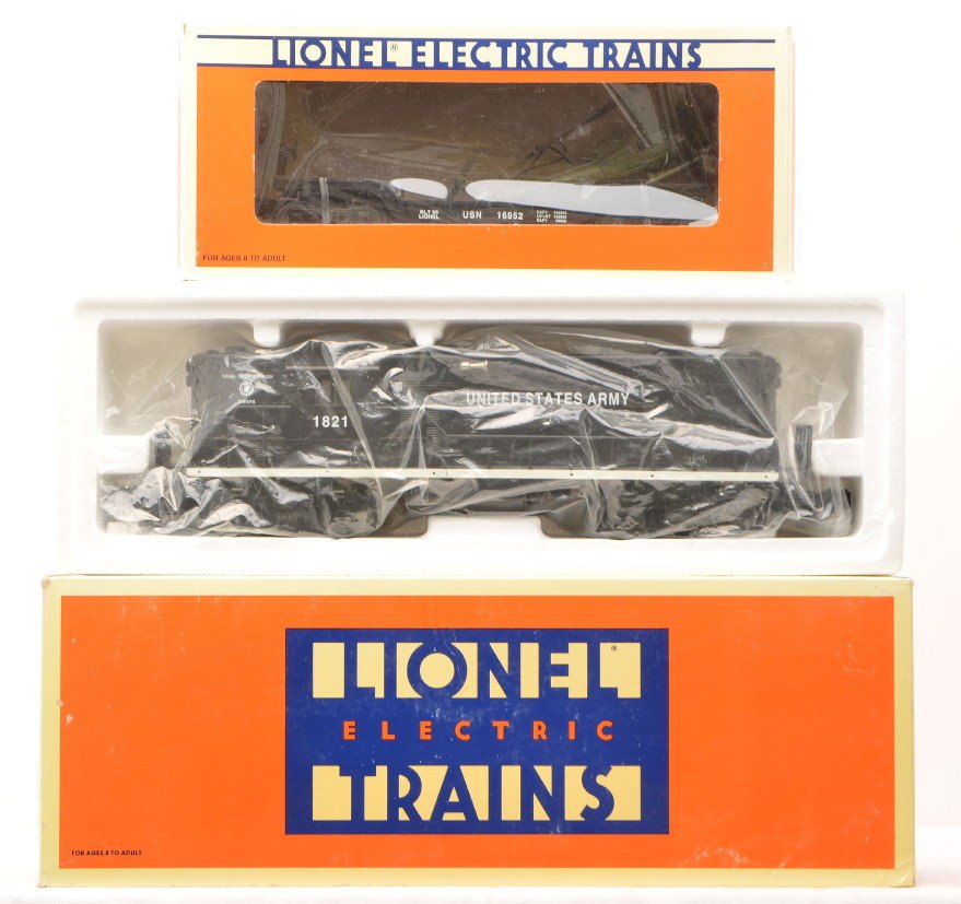 Lionel 18840 US Army GP7 16952 Navy Flat w/Ertl: Lionel 18840 U.S. Army GP-7 diesel and a 16952 U.S. Navy flatcar with Ertl helicopter both in OBs. The 18840 is C9 and the 16952 is C8.