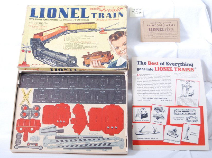 Lionel 50 Wartime Freight Train in OB Mint: Postwar Lionel O gauge 50 Wartime Freight Train set in original box with instructions sheet, factory sealed components envelope, and unpunched sheets of parts. Set components are C9-10. Box has split