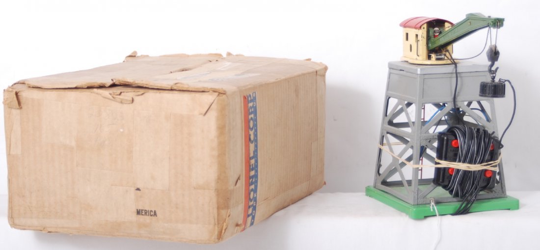 Lionel 165 magnetic crane w/controller in shipper: Prewar Lionel O gauge 165 magnetic crane with rewired controller in original shipping box with inserts, C6. Box is very square and solid with paper packing tape covering outer shipper.