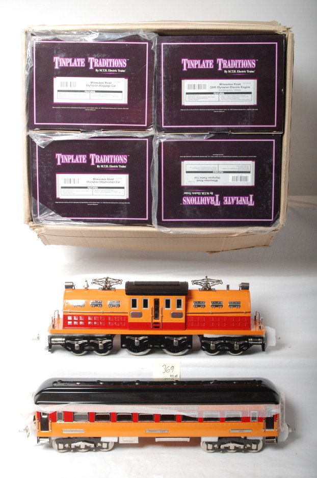 MTH Std. Milwaukee Olympian set 10-1176-1: MTH modern standard gauge tinplate 10-1176-1 Milwaukee Road Olympian set in OBs. This is the contemporary version. Loco features Protosound 2.0, DCS control and more. Loco and cars are high C8-9 with 