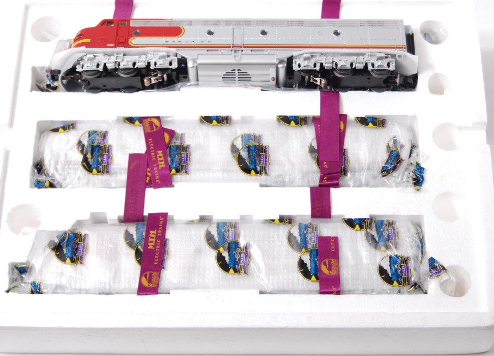 MTH Santa Fe E8 A-B-A set with Proto 2: MTH modern O gauge 20-2234-1 Santa Fe E8 A-B-A diesel locomotive set in OBs. Loco features Protosound 2.0, DCS control, Protosmoke, Protocoupler, and more. Powered A unit was only unwrapped for photos