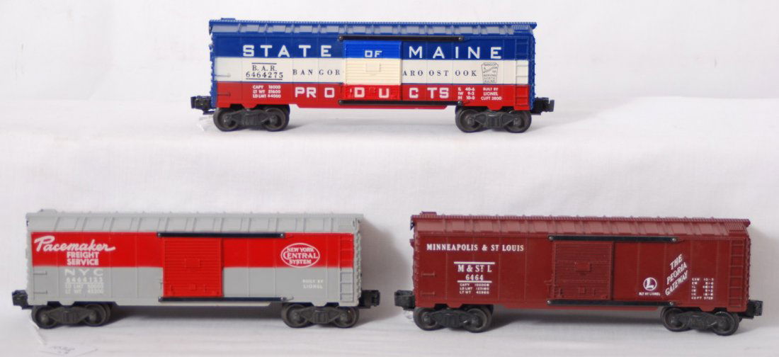 Lionel 6464-50, -125, and -275 boxcars: Postwar Lionel O gauge 6464-50 Minneapolis and St. Louis boxcar, 6464-125 New York Central Pacemaker, and 6464-275 State of Maine BAR boxcar, C7.