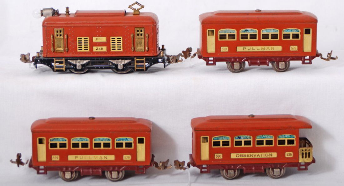 Lionel 248, 529, 529, 530 passenger train: Prewar Lionel O gauge 248 boxcar electric locomotive, two 529 Pullman coaches, and 530 observation, passenger cars, C6 with touchups.