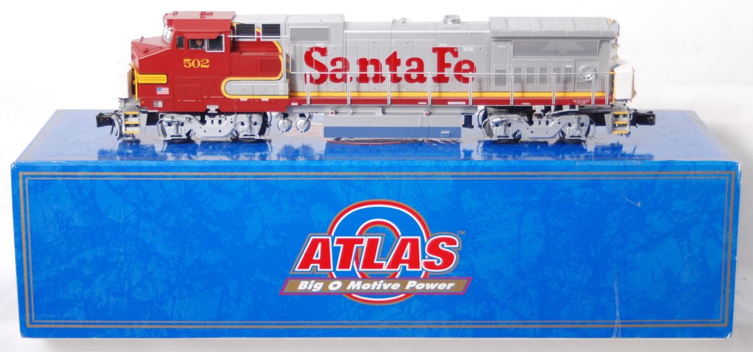 Atlas O Santa Fe Dash 8-40BW with TMCC: Atlas modern O gauge Santa Fe dash 8-40BW diesel locomotive in OB. Loco features TMCC, Railsounds, Electrocouplers, and much more. Loco is C8 with run time. Catalog number 6851-1. Loco is C8+ with ver