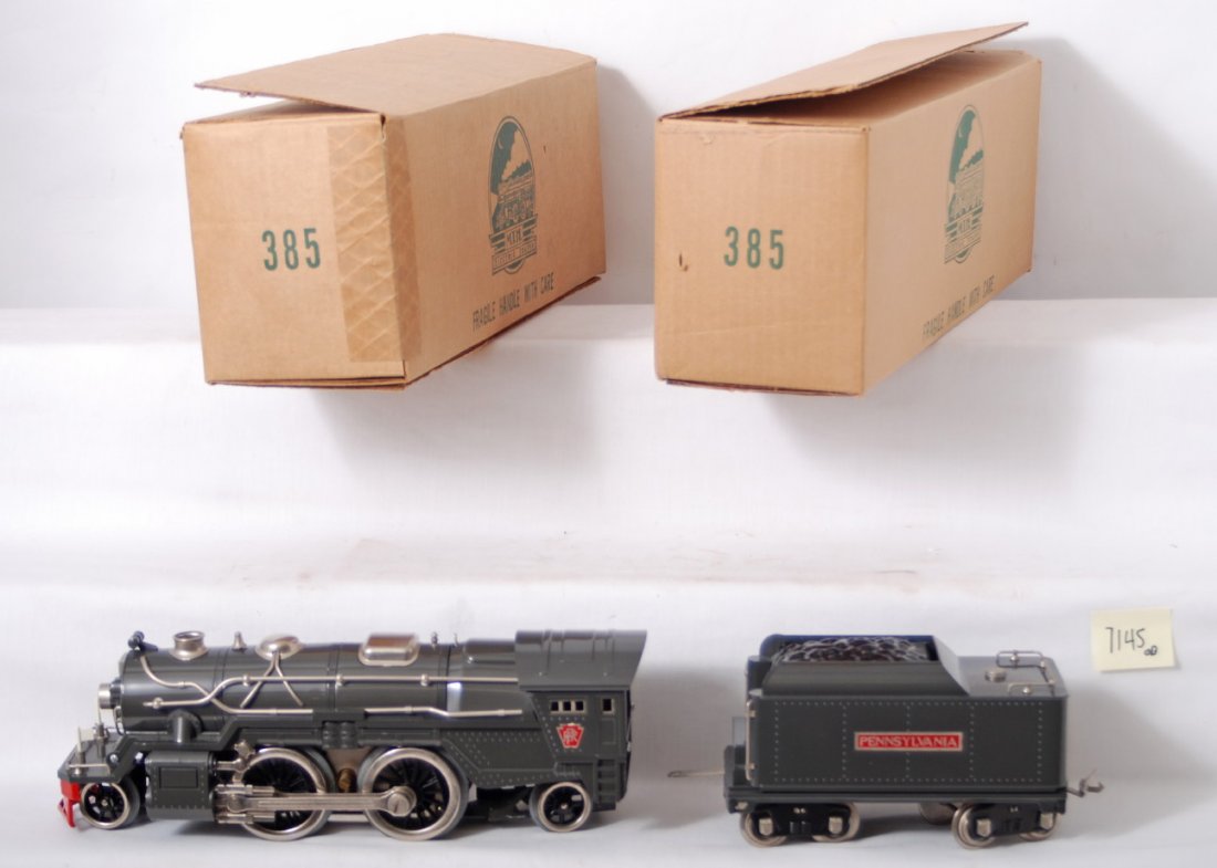 MTH Standard Gauge 385E gray with nickel trim: MTH modern standard gauge tinplate 385E gray steam locomotive in OB. Loco features nickel trim and is C8 condition with some run time. OBs have some light wear.