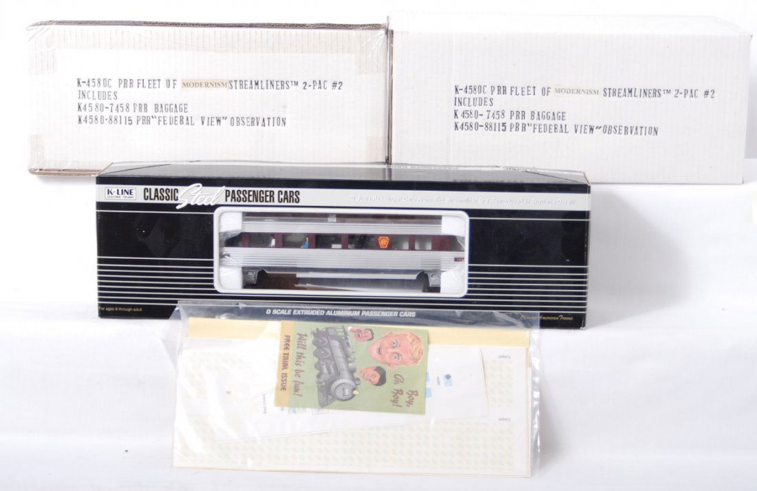 5 K line Pennsylvania passenger cars: K Line modern O gauge Pennsylvania passenger cars in OBs. Includes two K-4580C two packs with baggage and observation, and K4680-21000 aluminum business car. Packs are sealed C10, aluminum car is C8 w