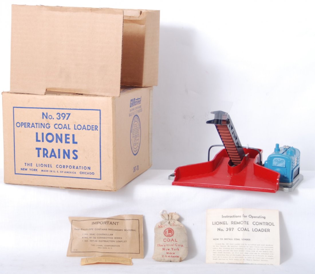 Lionel 397 operating coal loader in original box : Postwar Lionel O gauge 397 operating coal loader in original box with insert, instructions sheet, 397-53 components envelope with components and 207 bag of artificial coal. Loader looks C9 area and bo