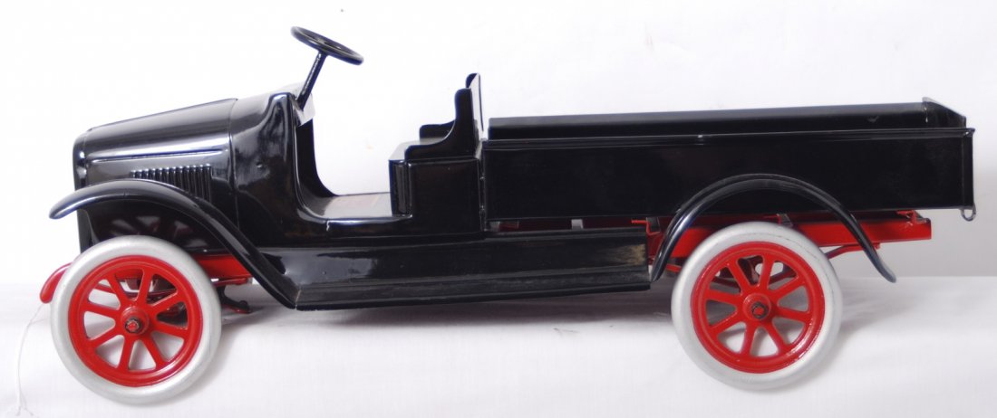 Buddy L pressed steel truck 24 inches long: Buddy L pressed steel truck repainted to look C7-8. Truck measures approximately 24 inches long.