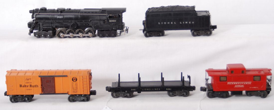 Lionel 2020, 6026W, X2454, and 3461, 2457: Postwar Lionel O gauge 2020 steam locomotive, 6026W whistle tender, X2454 Pennsylvania boxcar, 3461 automatic lumber car, and 2457 Pennsylvania caboose (broken smoke stack), C6.