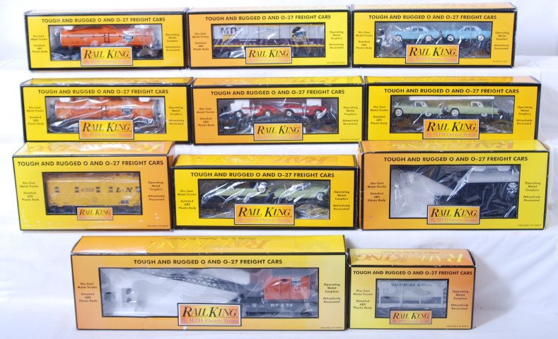 11 MTH Railking freight cars: MTH Railking modern O gauge freight cars in OBs. Eleven cars include 7518 Baltimore and Ohio ore car, two 7313 Southern Pacific tank cars, 7423 MTH club boxcar, 7624 flat with 64 Corvettes, two 7613 f