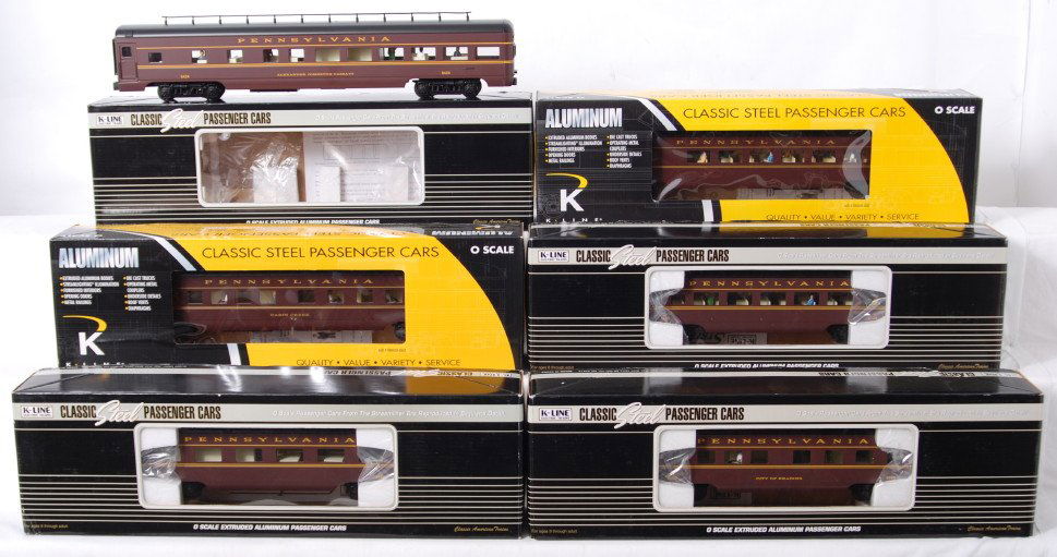 7 K Line Pennsylvania passenger cars: K Line modern O gauge Pennsylvania aluminum passenger cars in OBs. Seven cars include K4680- 34149 coach, 18424 observation, 38060 Pullman, 36420, diner, 30010 RPO, and 30011 Pullman. Cars are C8 with