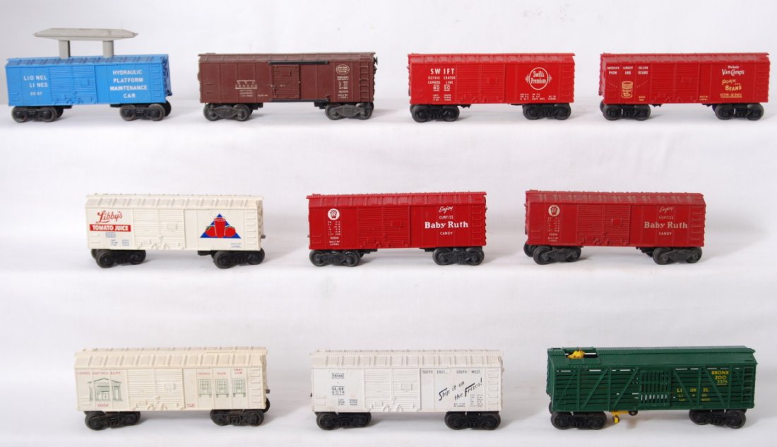 Lionel 3357, 3376, 6014, 6050, 638-2361, 6454: Postwar Lionel O gauge 3357 hydraulic platform maintenance, 3376 Bronx Zoo giraffe car, two 6014 PRR Baby Ruth boxcars (one missing catwalk end), 6014 Frisco boxcar, 6050 LibbyÕs boxcar w/coin slot, 