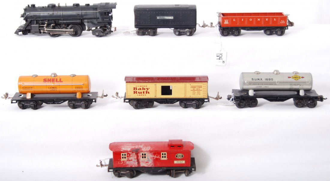 Lionel 1664, 1689W, 1680, 652 etc: Lionel prewar O gauge 1664 steam locomotive with 1689W, 1680 tank, 1680 tank, 652 gondola, 1679 boxcar, 1682 caboose. C5 to C6.