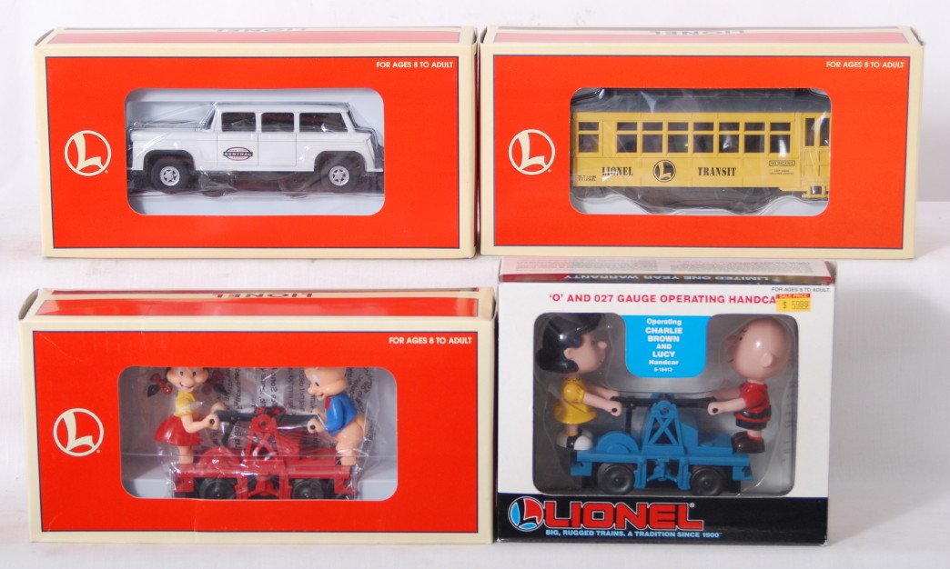 4 Lionel motorized units 18430, 18431, etc: Lionel modern O gauge motorized units in OBs. Includes 18434 Porky hand car, 18430 New York Central crew car, 18431 Lionel trolley, and 18413 Charlie Brown hand car. Cars range C8 to C10.