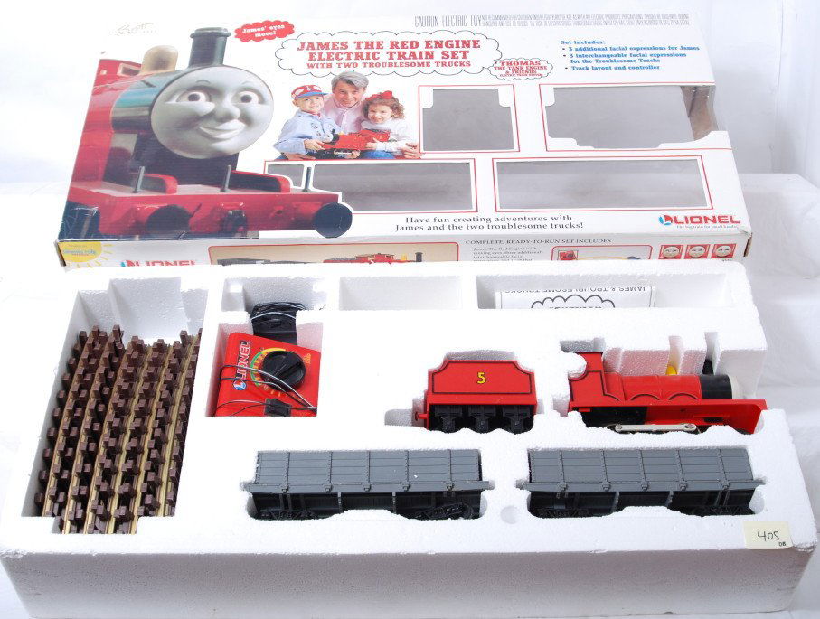 Lionel 81014 Thomas and Friends James set: Lionel modern G scale 81014 Thomas and Friends James the Red Engine set with two troublesome trucks. Set is C7-8 with run time and is complete with track and transformer. OB has light corner and edge