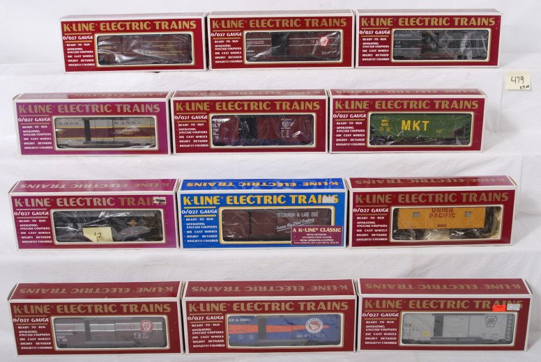 12 K Line freight cars PRR, Cotton Belt, etc.: K Line modern O gauge freight cars in OBs. Twelve cars include 643401 Pennsylvania boxcar, 6439 Union Pacific boxcar, 7508 Pennsylvania mail car, 6451 Cotton Belt boxcar, 6231 hopper, 7513 Erie Lackaw