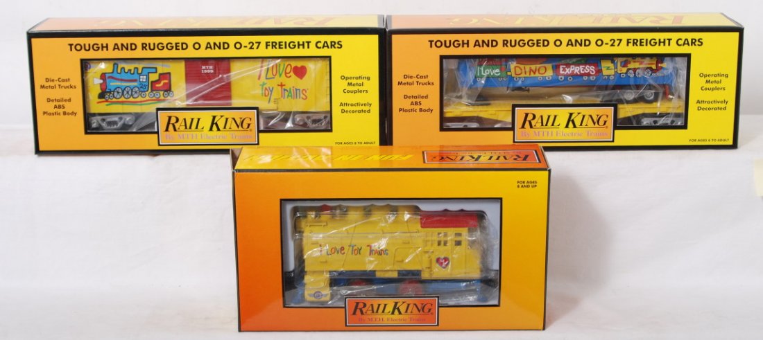 MTH Railking I Love Toy Trains loco and cars: MTH Railking modern O gauge I Love Toy Trains loco and cars. Include docksider steam locomotive, 30-7499 boxcar, and 30-7675 flat. Items are C8-9.