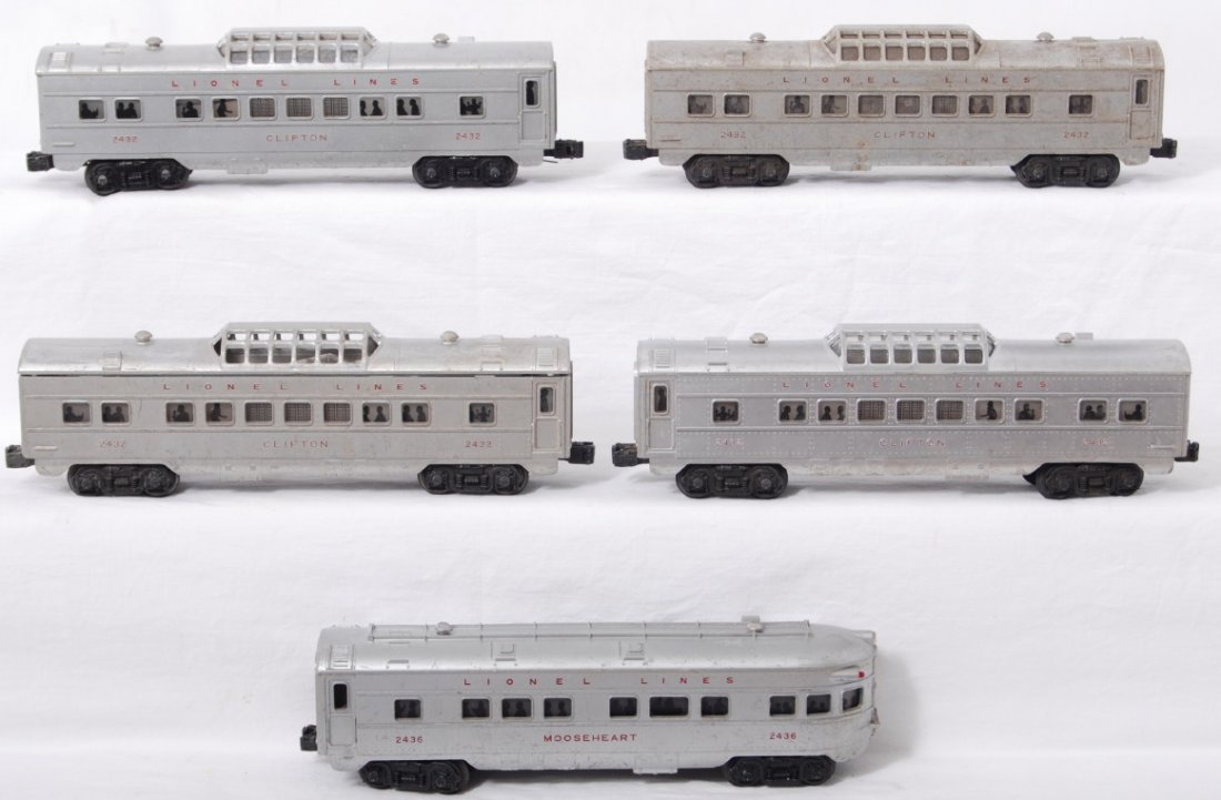 Postwar Lionel red letter pass. cars, 2432 x4 and: Postwar Lionel O gauge red letter passenger cars, four 2432 Clifton vista domes and a 2436 Mooseheart observation. Trains look C5-6.
