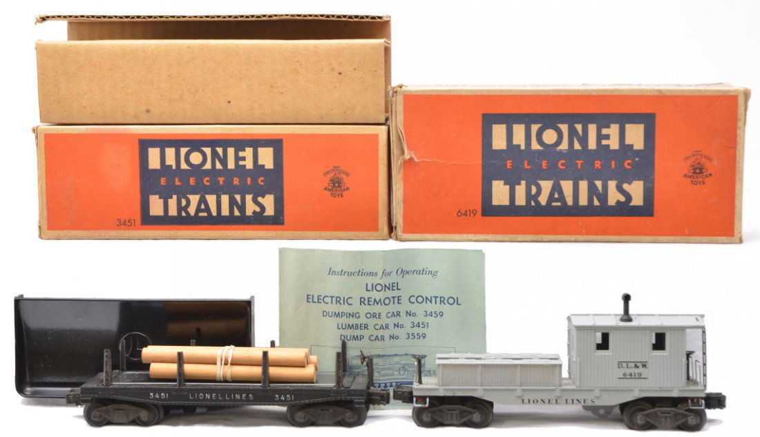 Lionel 3451 Lumber Car 6419 Work Caboose OBs: Lionel postwar 3451 automatic lumber car with lumber load, 160 bin and instruction sheet and a 6419 D.L.&W work caboose both in OBs, one that has an original cardboard insert. The 3451 has a small chi