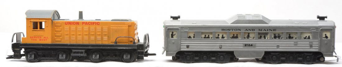 Marx 1998 UP Switcher 2124 B&M Budd Car: Marx 1998 Union Pacific Alco S-3 switcher. The corner of the cab has a chip in it. Switcher is C5. Also included is a 2124 Boston and Maine powered Budd RDC passenger car that is cracked on one end an