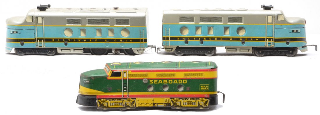 Marx Litho 62 B&O EMD F3 AA 4000 Seaboard FM: Marx postwar lithographed 62 Baltimore & Ohio EMD F3 AA diesels. Also included is a lithographed 4000 Seaboard powered A FM diesel. The diesels are C5.