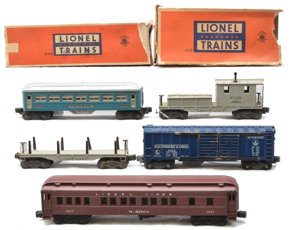 Lionel Misc. Cars 2627 2640 2411 6468 6419: Lionel postwar miscellaneous cars; 2627 Madison Pullman, 2640 blue and silver Pullman, 2411 flatcar, 6468 Baltimore & Ohio boxcar in a worn OB and a 6419 D.L.&W work caboose in a worn OB. Cars are C4-