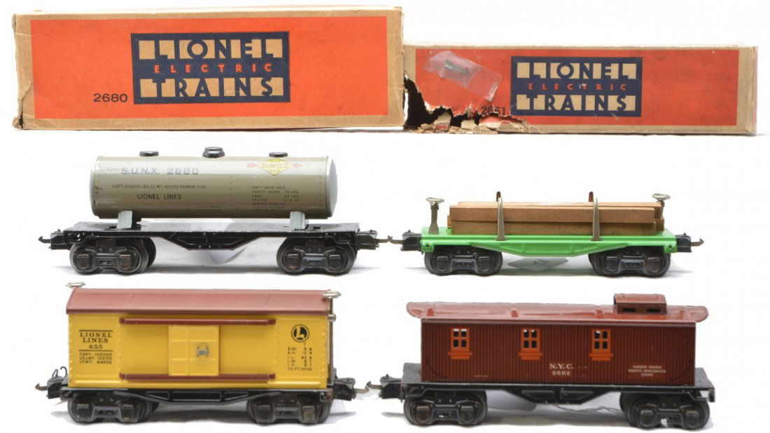 Lionel Freights 2680 2651 OBs 655 2682: Lionel prewar O gauge 2680 gray Sunoco tank and 2651 green lumber car both in worn OBs that are missing flaps. Also included is a 655 cream boxcar with brown roof and door guides and a 2682 brown lith