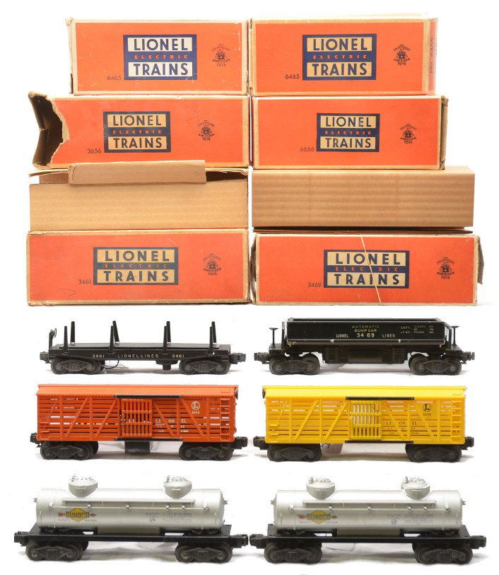 Lionel 3461 3469 3656 6465 6465 6656 Boxed: Lionel postwar freight cars; 3461 automatic lumber car with an original cardboard insert, 3469 automatic dump car with an original cardboard insert, 3656 operating cattle car, two 6465 silver Sunoco t