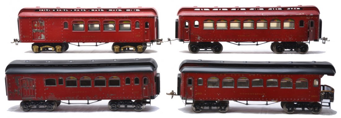 Ives Red Passenger Cars 187 188 189 187: Ives prewar wide gauge red passenger cars with four wheel trucks that have no journals including; 187 buffet car, 188 Parlor car and a 189 observation. The 187 and 189 have repainted black roofs. Also