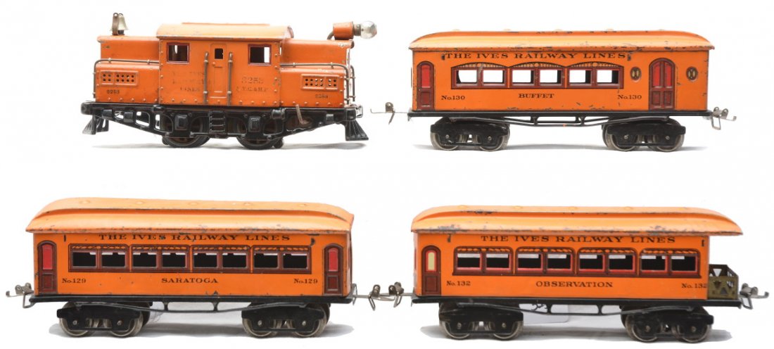 Ives Orange Litho Pass Set 504 3253 130 129 132: Ives prewar O gauge orange lithographed passenger set no. 504 including; 3253 electric 0-4-0 loco, 130 Buffet, 129 Saratoga Pullman and a 132 observation car. Set is C5.