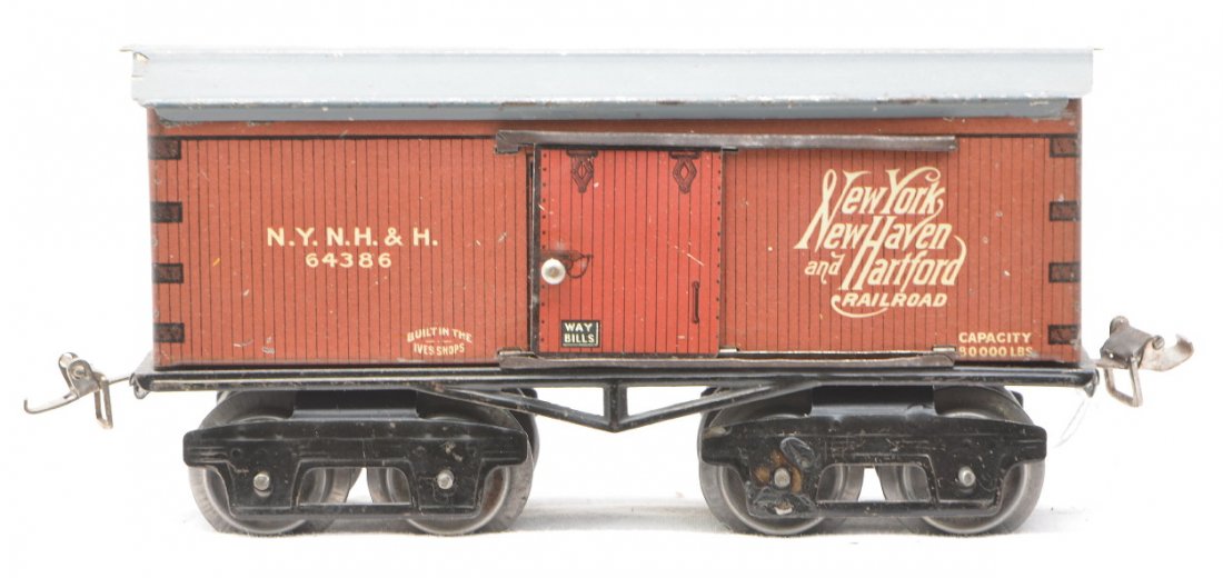 Ives 64386 Red Litho N.Y.N.H.& H. Merchandise Car: Ives prewar O gauge eight wheel 64386 New York, New Haven and Hartford red wood simulated lithographed merchandise car with a gray enameled roof, C6.