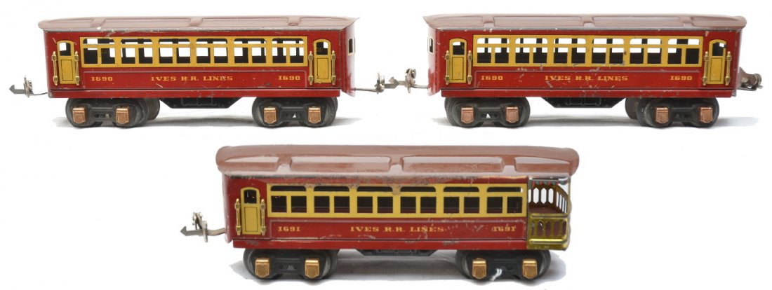Ives 8-Wheel Red Litho Pass Cars 1690 1690 1691: Ives prewar O gauge eight wheel red lithographed Ives R.R.Lines passenger cars with brown roofs, yellow trim and copper journals; two 1690 Pullmans and a 1691 observation. Cars are C5.
