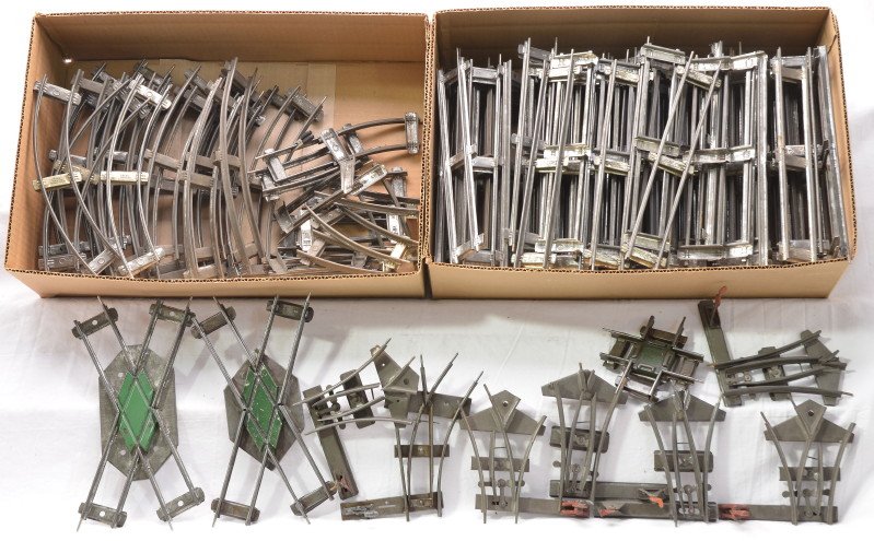Ives Selection of 2-Rail Track Sections Switches: Ives prewar O gauge large selection of curve and straight sections of two rail track, 90-degree crossover, two 45-degree crossovers, three pairs of clockwork switches and one single switch. Please vie