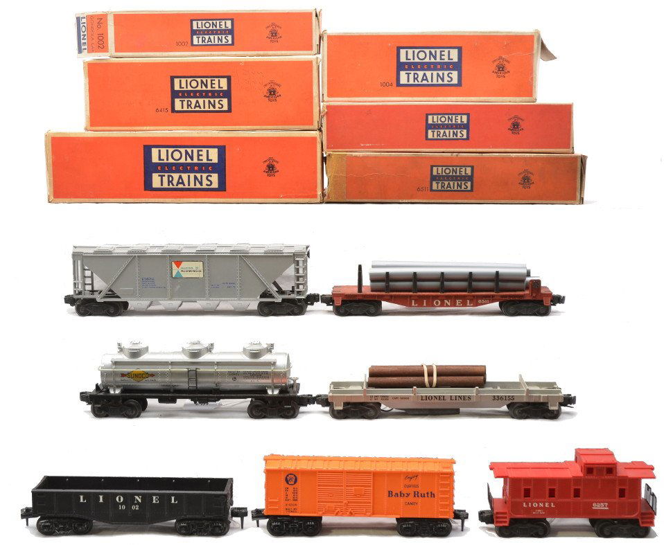 Lionel 6415 6436 6511 3361X 1004 1002 OBs 6257: Lionel postwar freight cars: 6415 Sunoco three dome tank, 6346 Alcoa covered hopper, 6511 pipe car with five silver plastic pipes, 3361X operating lumber car, 1004 Baby Ruth boxcar and a 1002 gondola