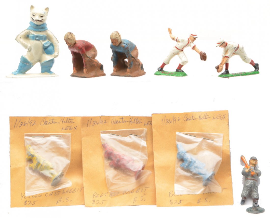 Auburn Rubber Football Tommy Toy Puss N Boots: Auburn Rubber football lineman composite figures and die cast baseball figures. Also included is a Tommy Toy Nursery Rhyme Puss ÔN Boots die cast figure and three die cast rabbits. Please view photo