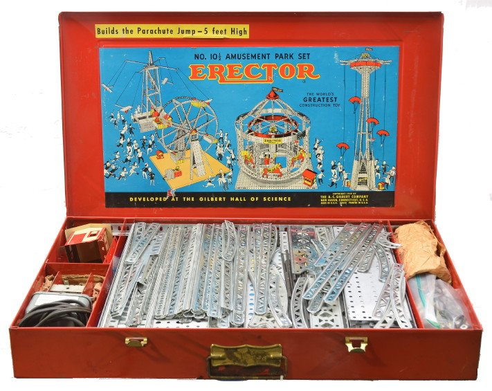 A.C. Gilbert Erector no. 10 1/2 Amusement Park: A. C. Gilbert co. Erector no. 10 1/2 amusement park set in a red metal case which appears to be complete with all components. The inside and outside of the case has nice color labels. Please view phot