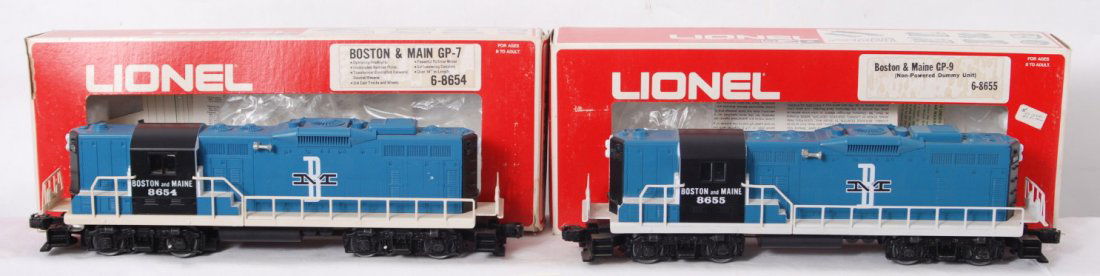 Lionel Boston and Maine 8654 8655 GP-9 loco: Lionel modern O gauge Boston and Maine 8654 and 8655 GP-9 diesel locomotives in OBs. One power and one dummy. Locos are generally C8 however frame on powered unit has yellowed slightly. OBs have light
