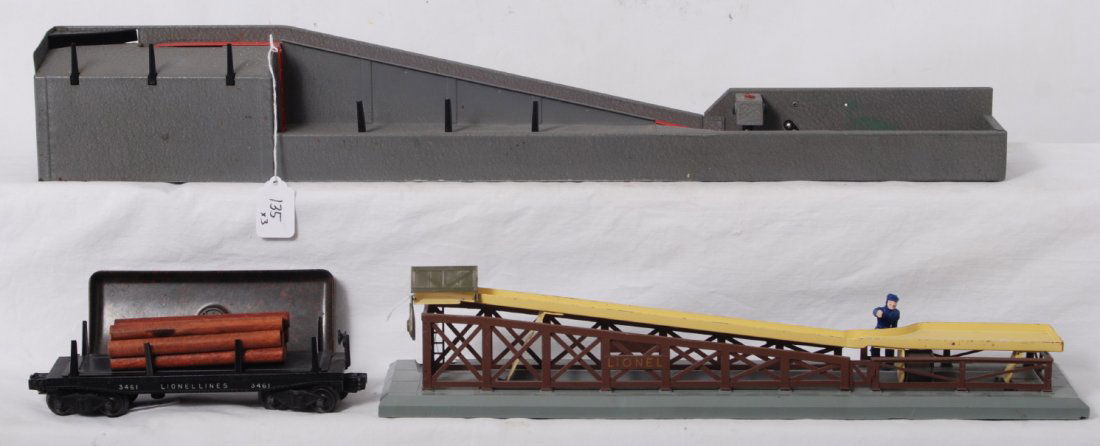 Lionel 364 lumber loader, 362 barrel loader, 3461: Postwar O gauge Lionel 364 lumber loader (a little green layout paint) and 362 barrel loader with a 3461 automatic lumber car, C6 area.