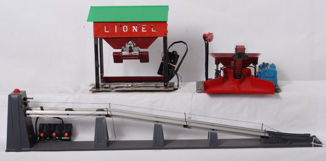Lionel 397, 456, 497 operating accessories: Postwar Lionel O gauge operating accessories, 397 coal loader with Marx? lamp attached, 456 coal loading ramp in dark gray variation with controller, and 497 coal loader w/controller. 397 and 456 can 