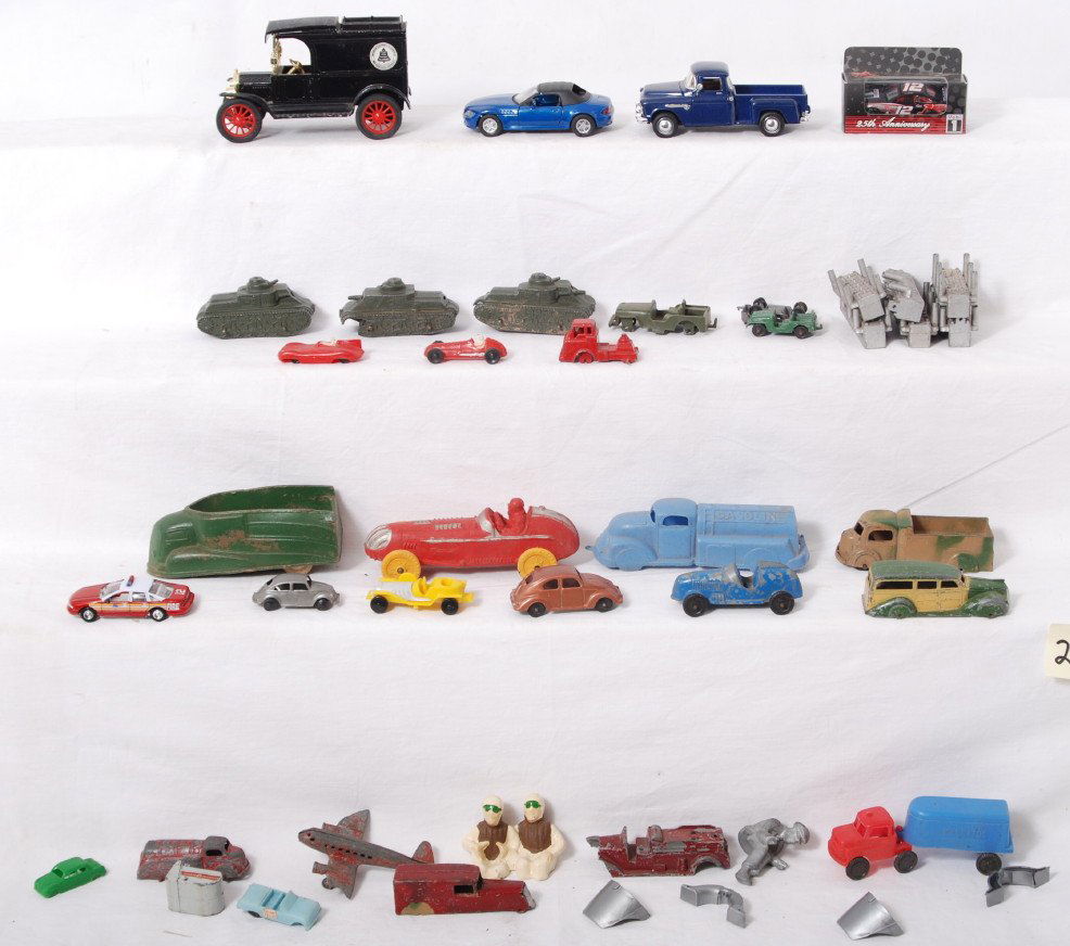 Diecast, rubber, lead cars Figures for Lionel boat: Large lot of modern era and vintage era diecast, rubber, plastic and lead cars, trucks, tanks, airplane, and other vehicles. Condition ranges from C7-8 to C0. Manufacturers included, Tootsietoy, Ertl,