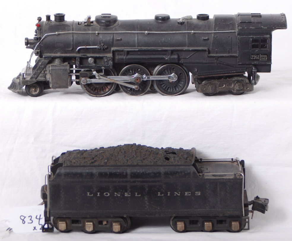 Lionel 226E steam locomotive and 2226W whistle ten: Prewar Lionel O gauge 226E steam locomotive and 2226W whistle tender, 1/2 inch crack in corner of coal pile and missing coupler key, some very light surface rust on underside of loco, C6.